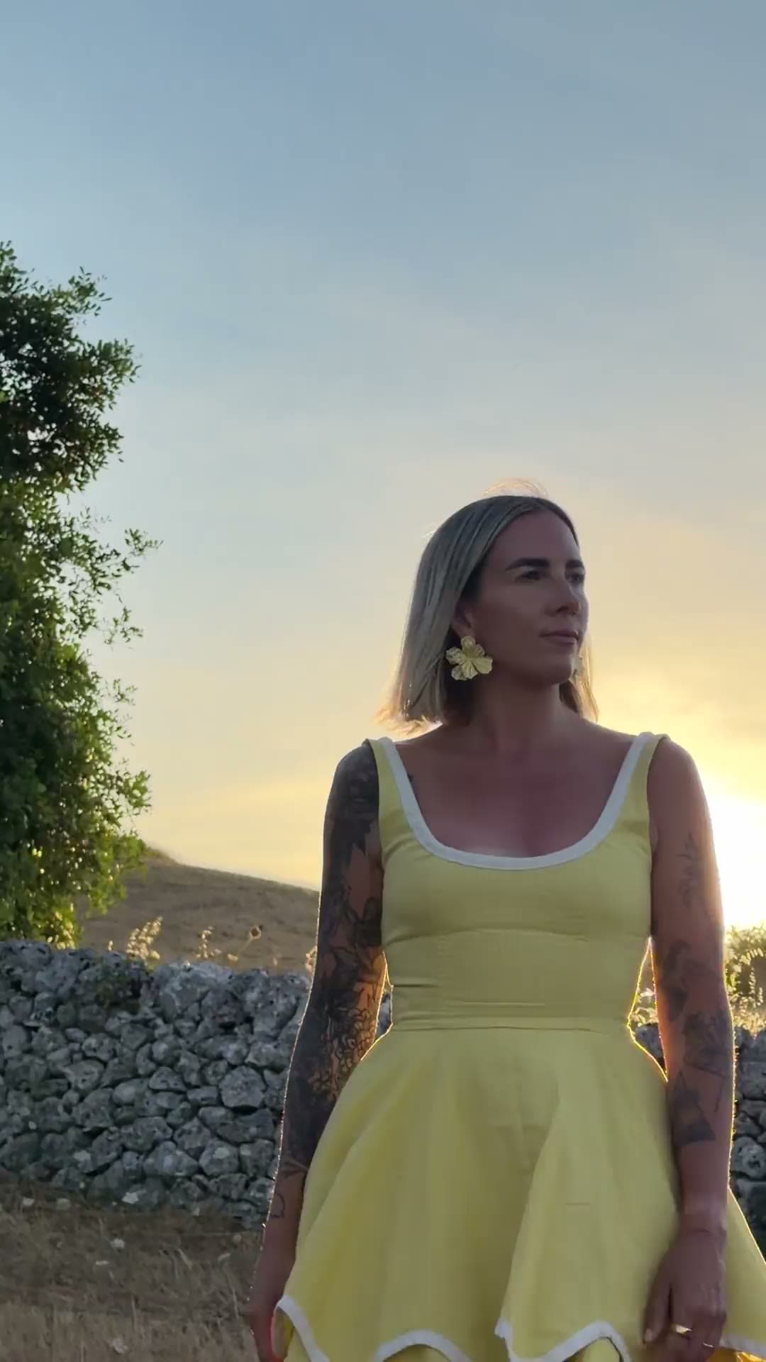 Kat Moore at golden hour in the olive orchard near Noto, Sicily