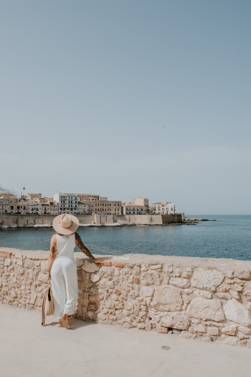 Kat Moore looking out over the Mediterranean in Ortigia